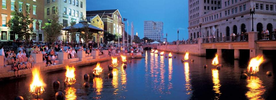 Waterfire in Providence, RI lit up at night.